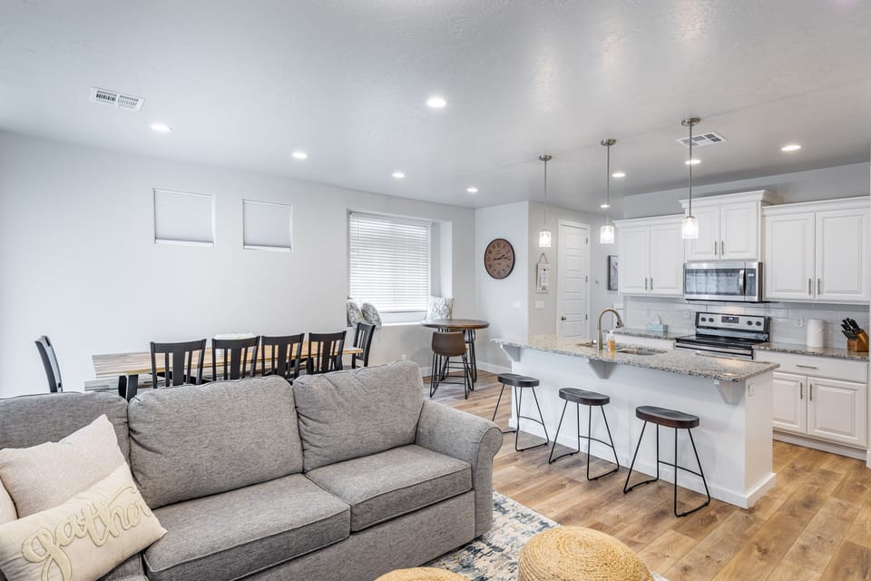 Family Room - The Living Room is conveniently located adjacent to the Kitchen and Dining Table and is a great place for entertaining guests during downtime.
