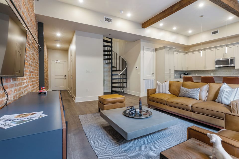 Open concept living and kitchen area with comfortable seating options for you and your guests. 58” Samsung Smart 4K TV that allows for streaming from your favorite apps, along with the DIRECTV Entertainment. All the natural light too!