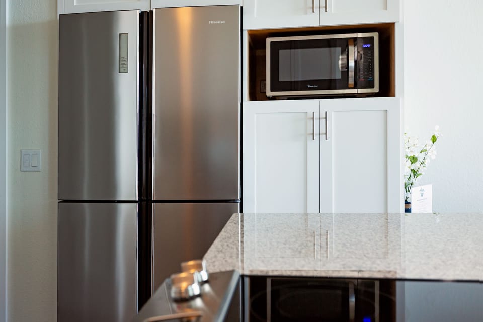 Sleek stainless-steel appliances await your culinary adventures in paradise!