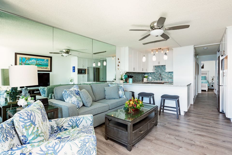 Bright and airy with ocean-inspired decor, perfect for lounging and dining!