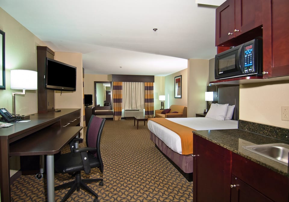 In-room safe, desk, iron/ironing board, cribs (free)