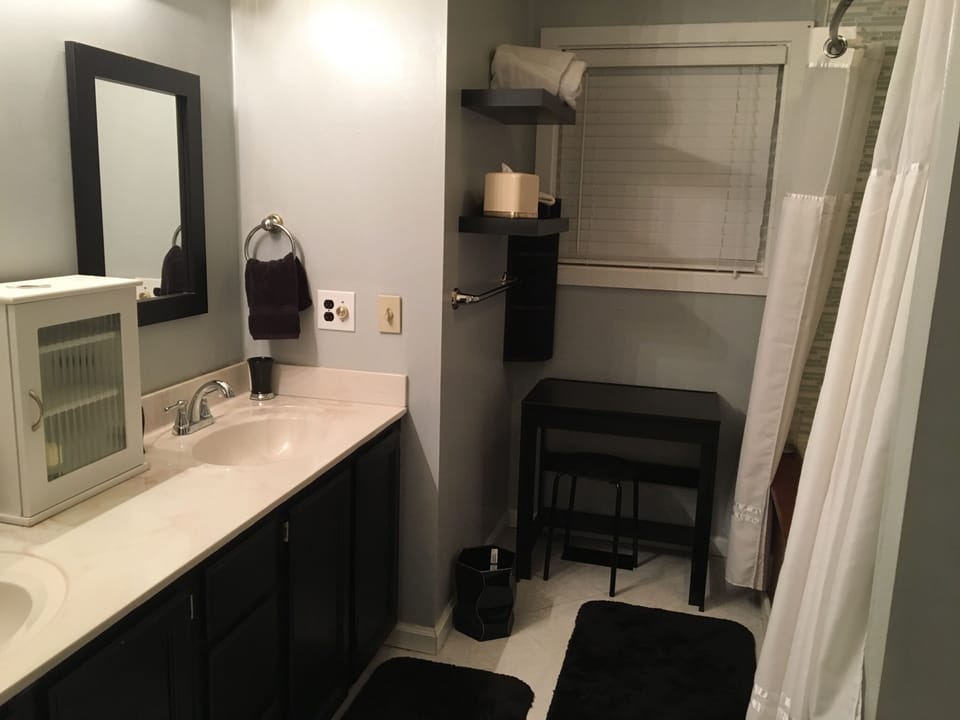 Two sinks and a giant shower!  Middle level bathroom