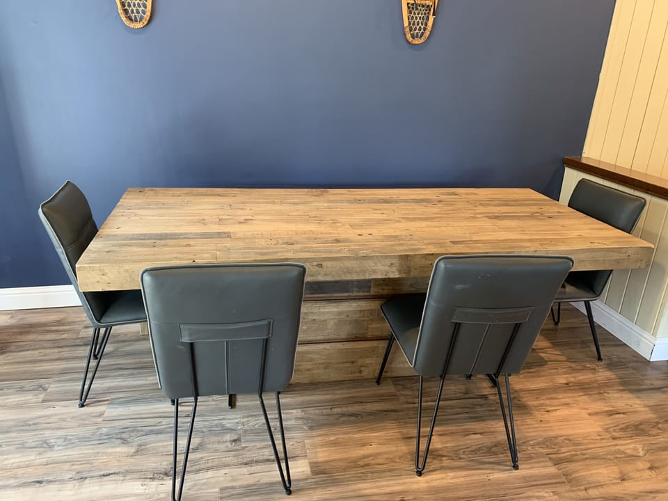 Dining room table, chair and large bench. It can fit 8 or more people.