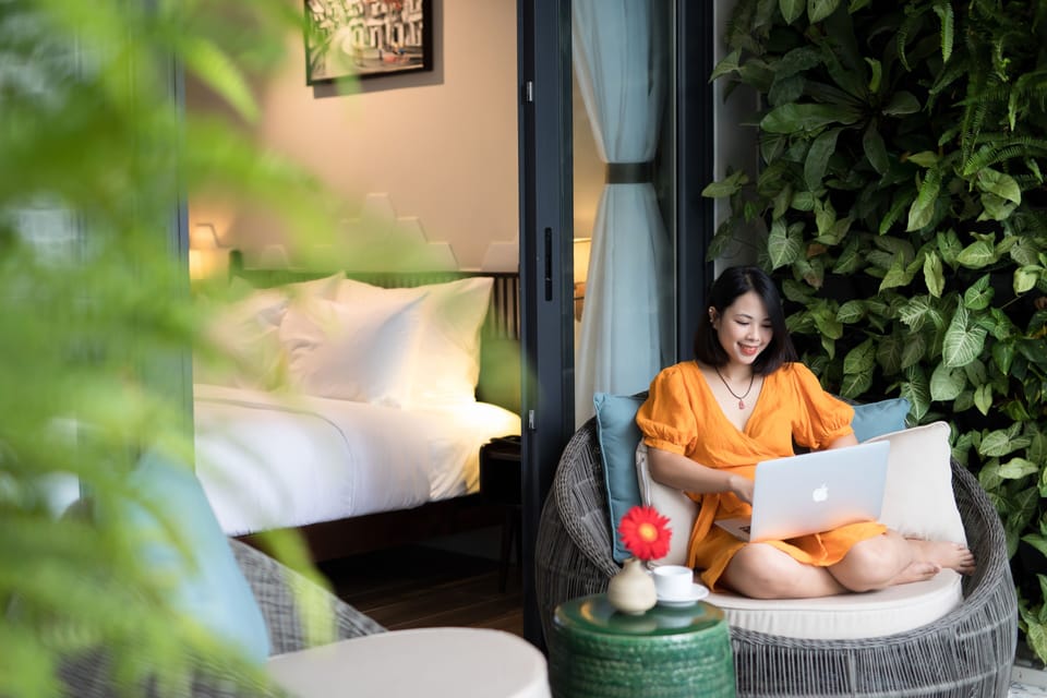 King Suite, Pool View | Minibar, desk, laptop workspace, blackout drapes