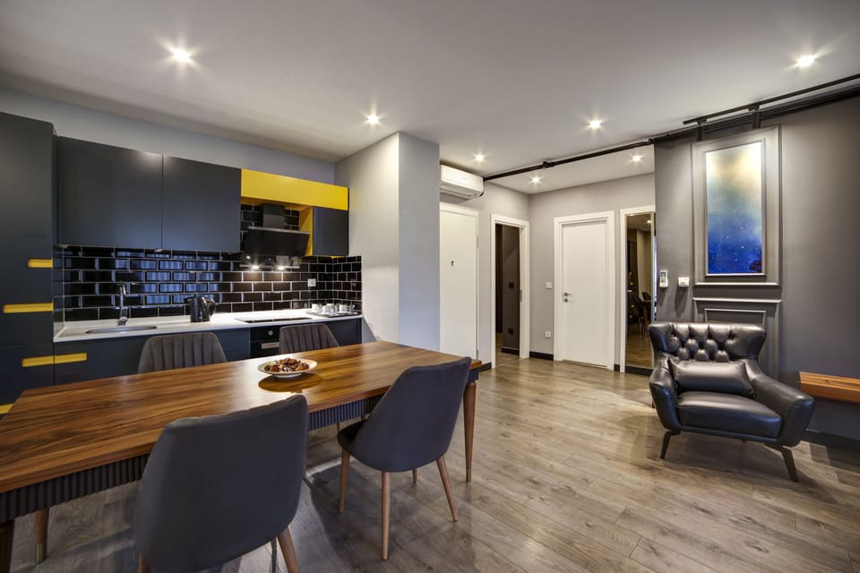 Executive Suite, 2 Bedrooms | Private kitchen | Full-size fridge, microwave, oven, stovetop