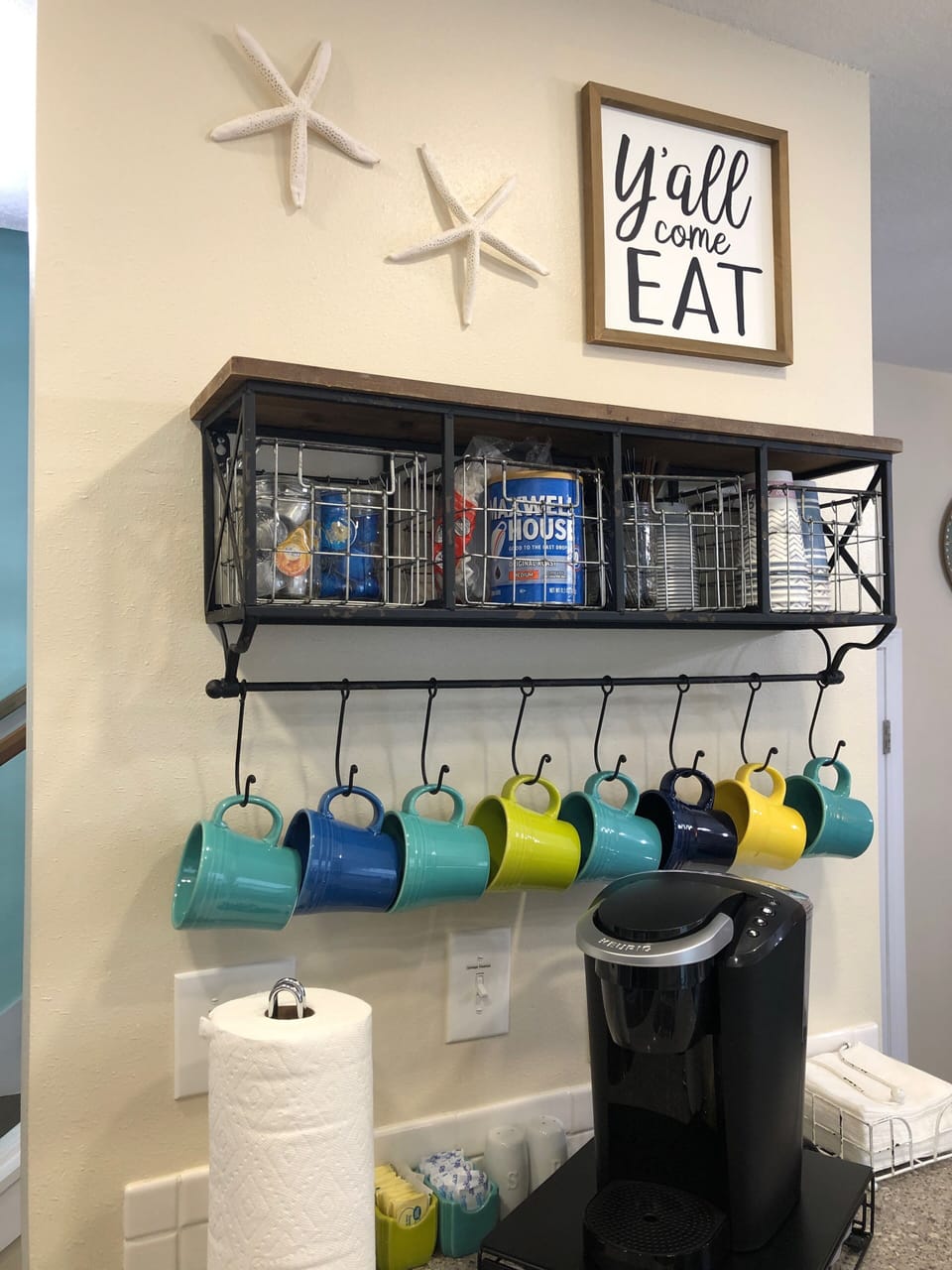 Coffee station with K-cups, creamers, sugar packets and to go cups