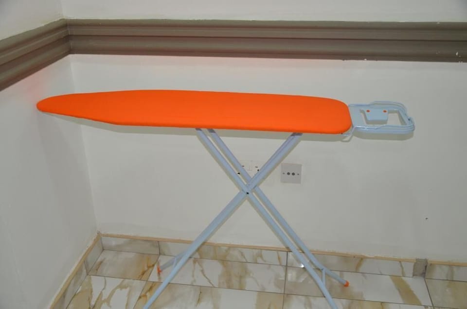 Deluxe Apartment | Iron/ironing board