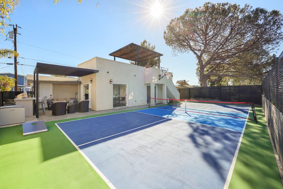 Full-size pickleball court and a versatile basketball hoop.