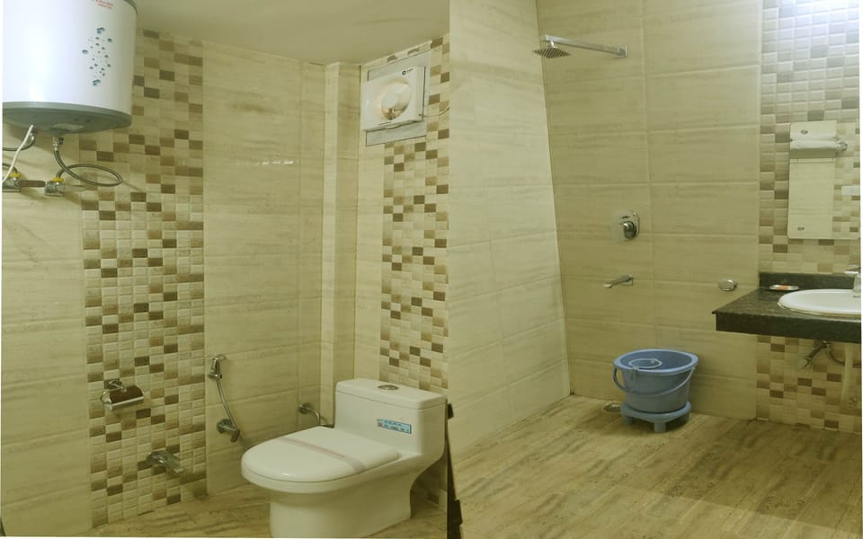 Shower, free toiletries, hair dryer, slippers