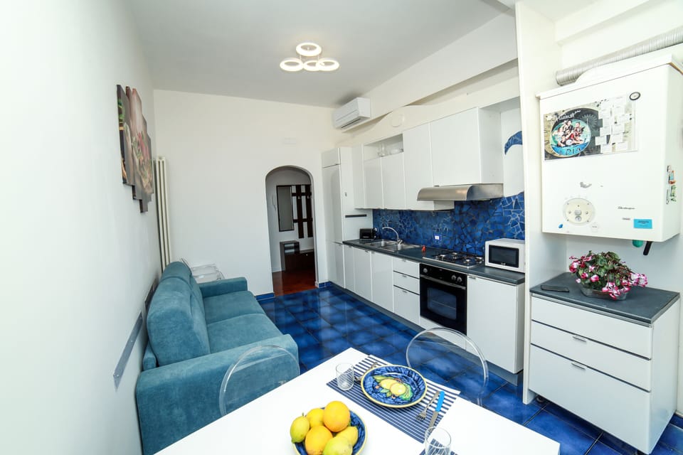 Family Apartment, 2 Bedrooms, Sea View | Private kitchen | Full-size fridge, microwave, oven, stovetop