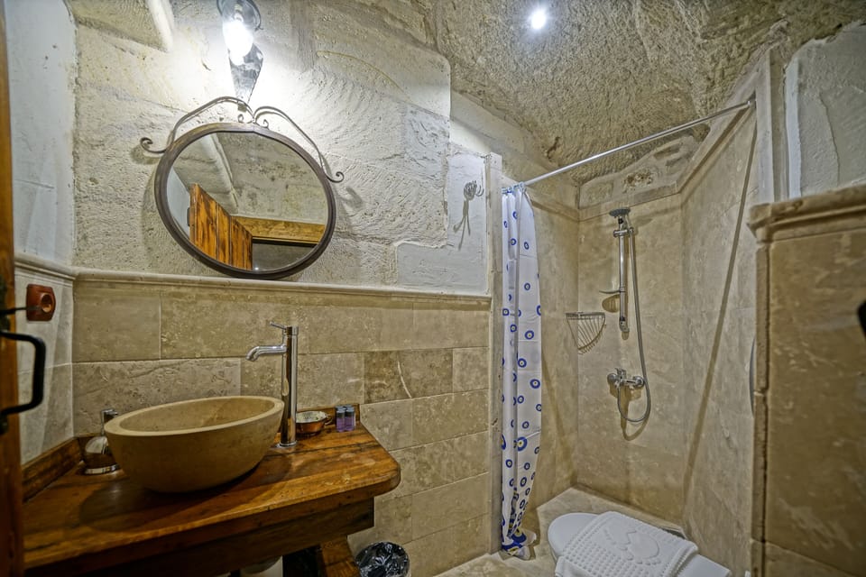 Family Room | Bathroom | Shower, slippers, towels