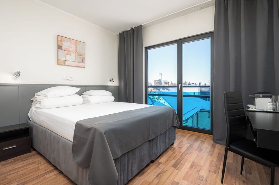 Iron/ironing board (on request), WiFi (free), bed sheets