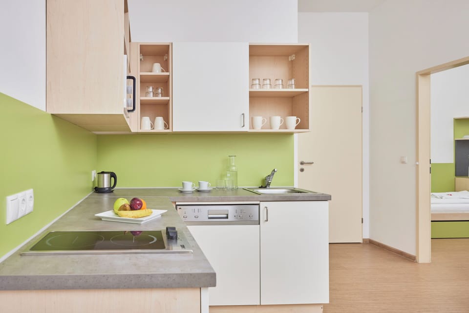 Superior Apartment, 2 Bedrooms | Private kitchen | Fridge, microwave