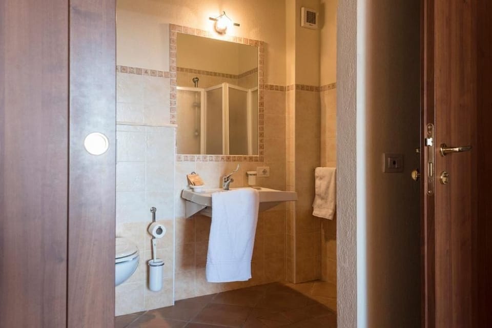 Quadruple Room, Garden View | Bathroom | Shower, hair dryer, towels, soap