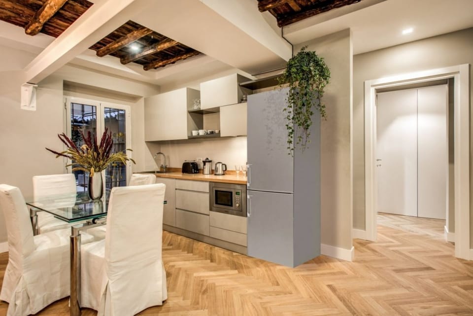 Apartment, 3 Bedrooms | Private kitchen | Full-size fridge, microwave, stovetop, coffee/tea maker