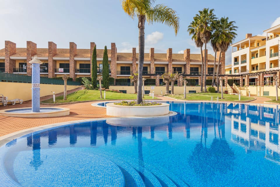 Townhouse has easy access to the pool from the breakfast terrace (c100feet)