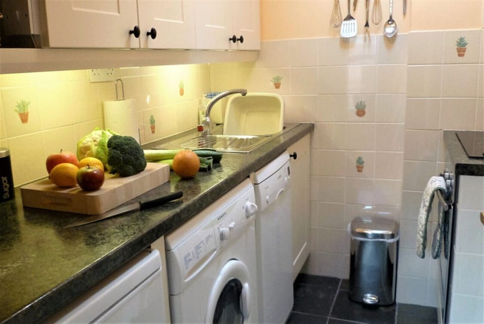 Well equipped small separate kitchen Dishwasher Microwave Washer/Dryer Oven Hob