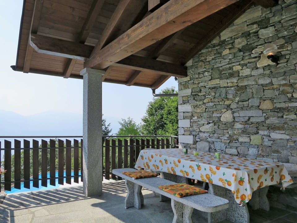 Property, Building, Room, Porch, Furniture, House, Real Estate, Table, Cottage, Architecture