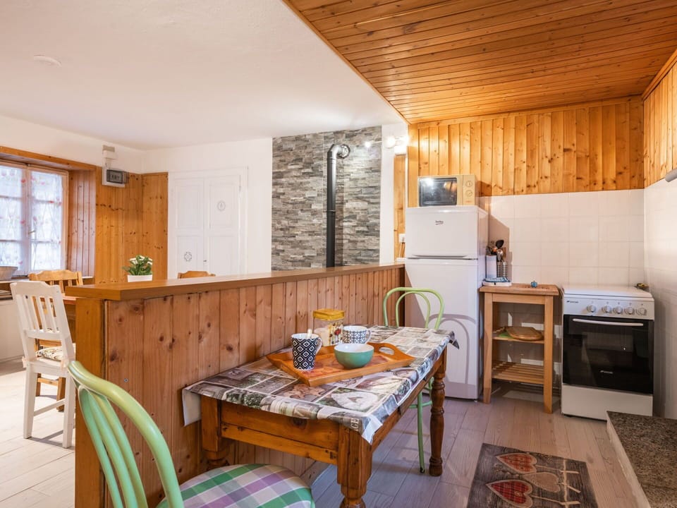 Table, Furniture, Cabinetry, Property, Wood, Kitchen, Countertop, Interior Design, Kitchen Appliance, Window