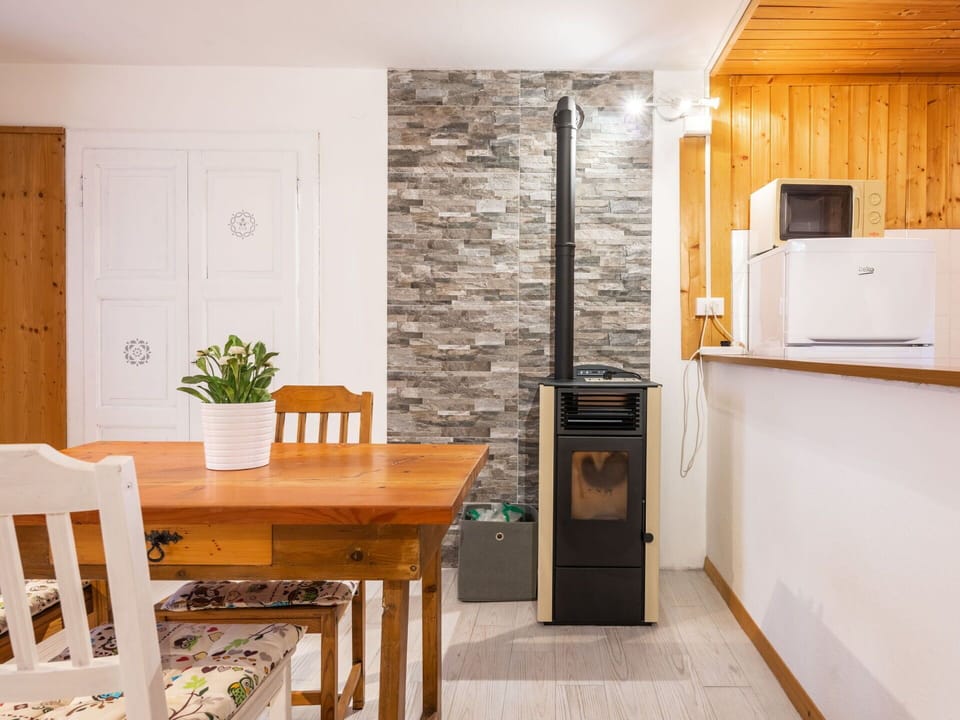 Cabinetry, Furniture, Property, Countertop, Table, Plant, Wood, Kitchen, Interior Design, Kitchen Appliance