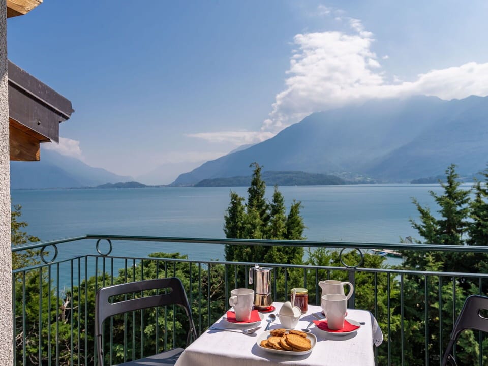 Cloud, Sky, Water, Table, Mountain, Furniture, Property, Tableware, Chair, Outdoor Furniture
