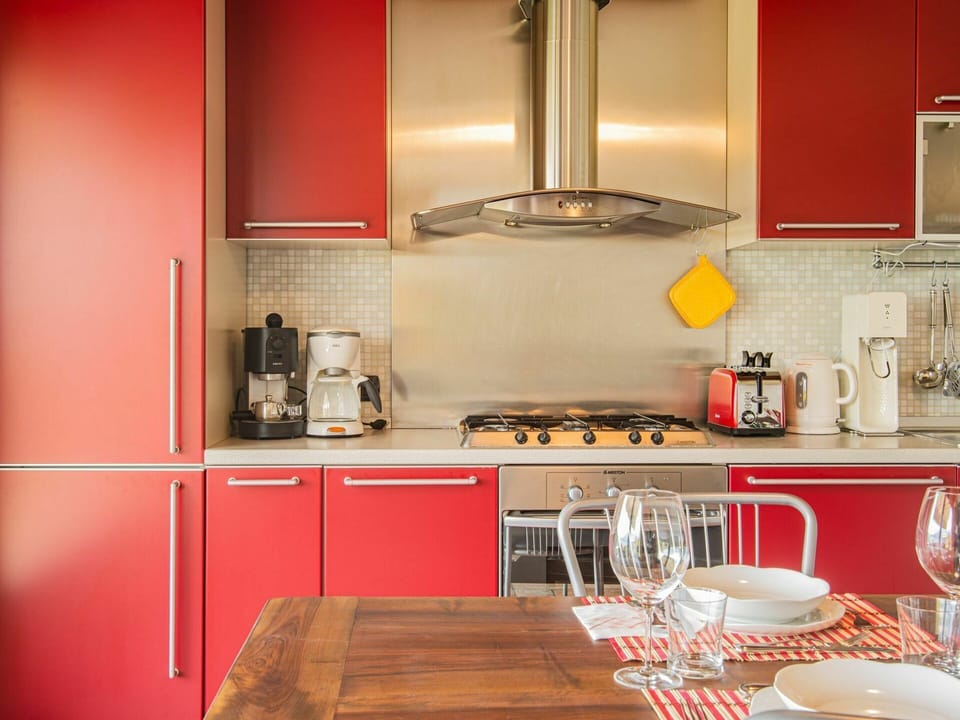 Countertop, Cabinetry, Tableware, Property, Kitchen Appliance, Kitchen, Kitchen Stove, Home Appliance, Wood, Interior Design