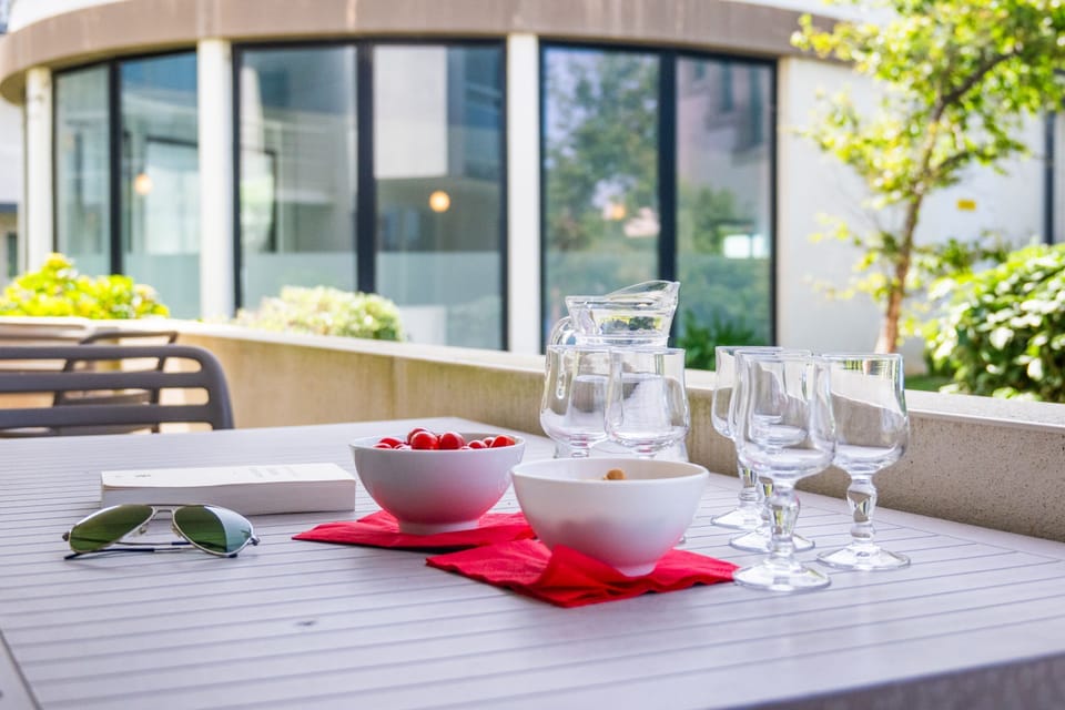 Step out onto the balcony for some fresh air before heading down to the beach.