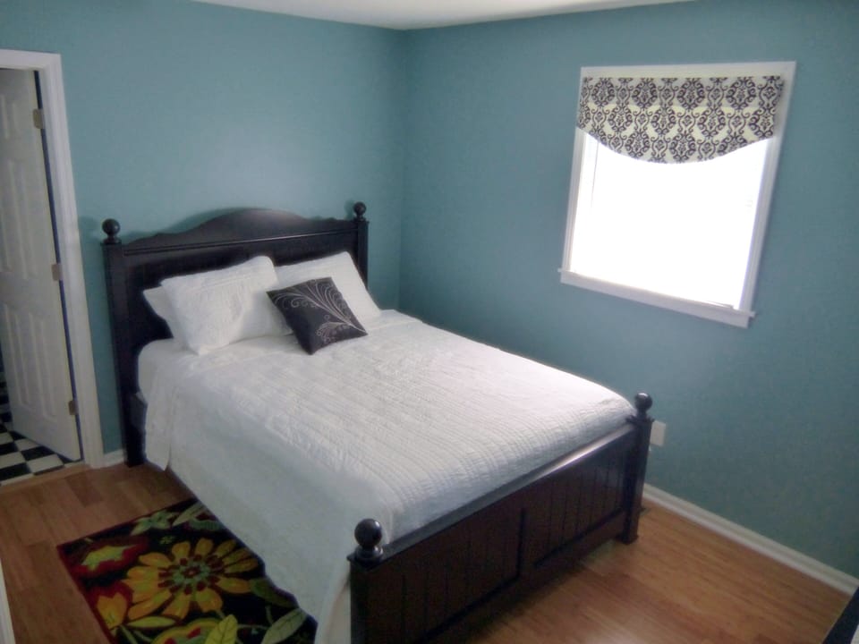 Queen bed in bedroom 1, twin bed in bedroom 2, and sofa sleeper in living room