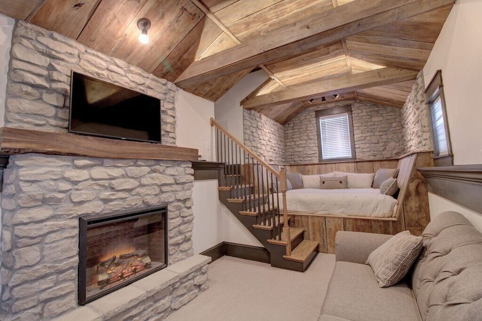 Lovely master bedroom with fireplace and sitting area. 