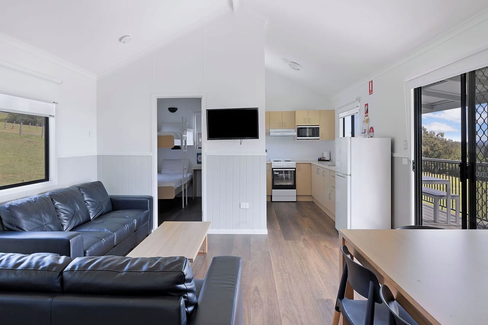 Deluxe Cabin - Sleeps 6 | Private kitchen | Coffee/tea maker, full-size fridge, microwave, stovetop