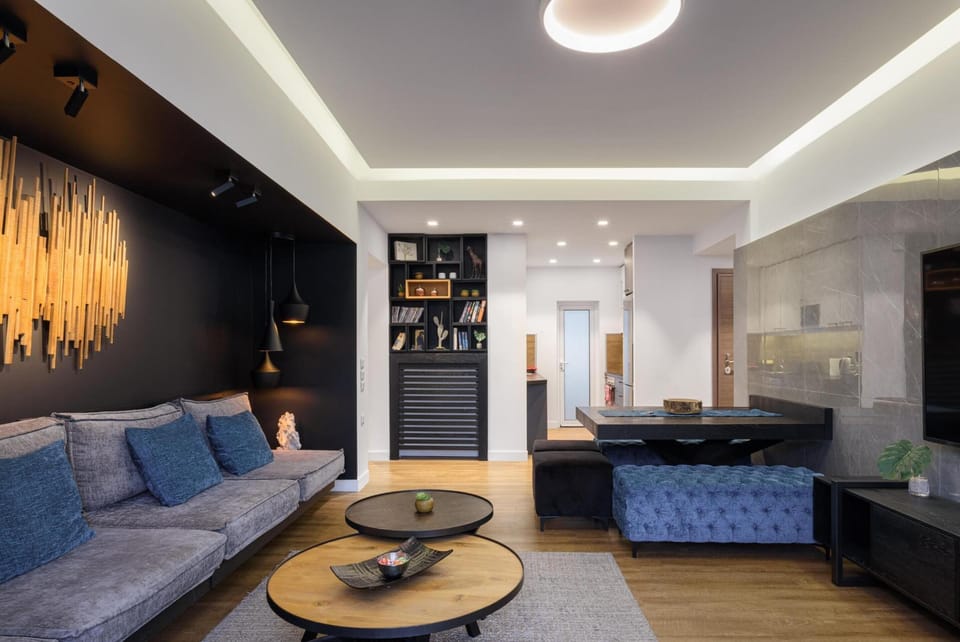 Exclusive Apartment, 4 Bedrooms | Living area | 70-inch flat-screen TV with cable channels, Smart TV, Netflix