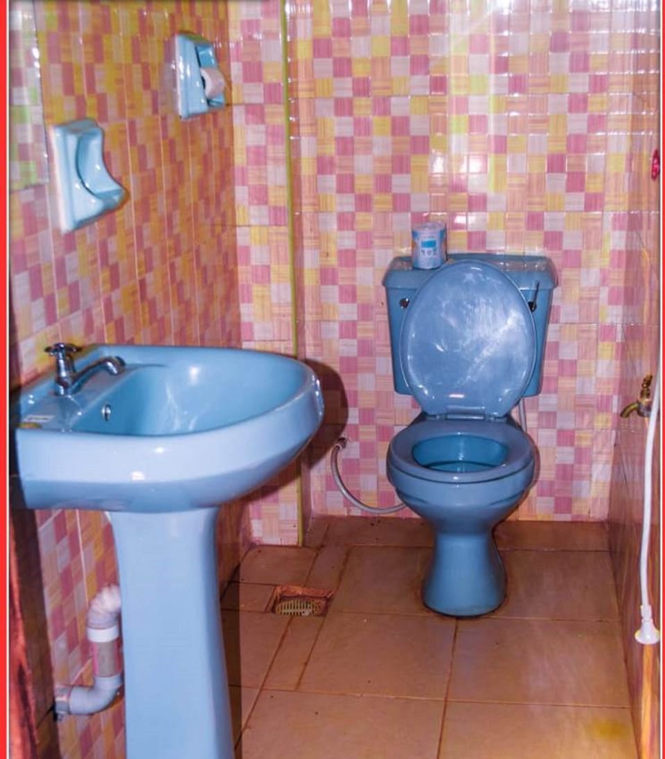 Shower, slippers, towels, soap