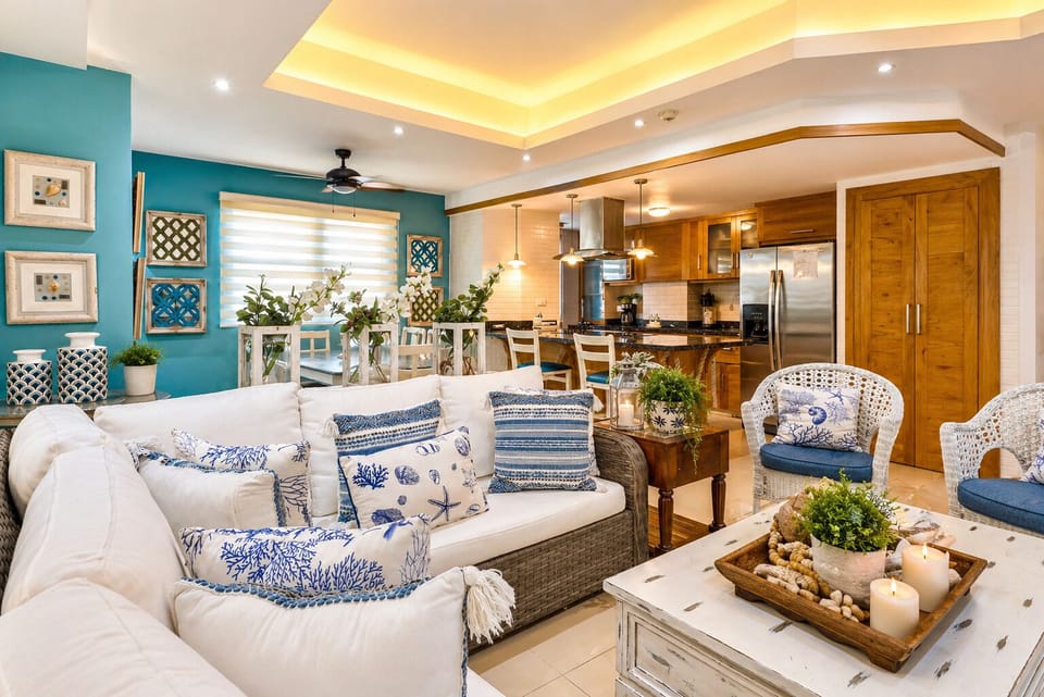 Spacious living room with central A/C, smart TV & open kitchen