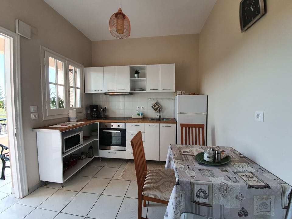 Family Apartment, 2 Bedrooms | Private kitchenette | Full-size fridge, electric kettle, cookware/dishes/utensils