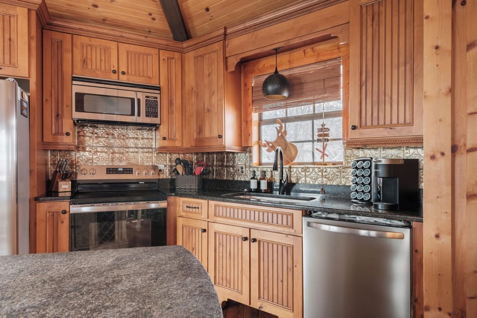 Cook with ease using stainless steel appliances, granite counters, and all the essentials.