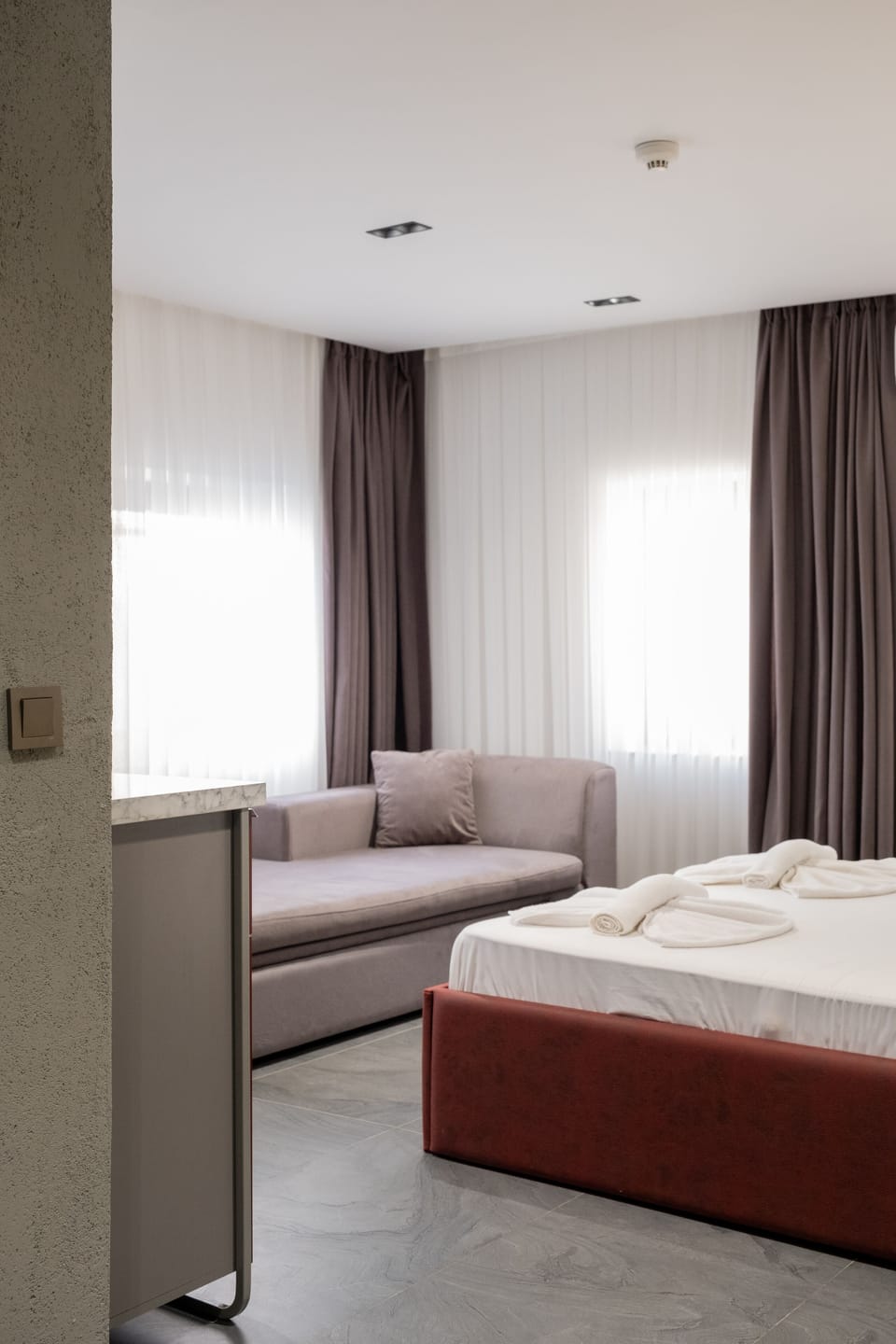 Deluxe Double Room | Living area | LCD TV