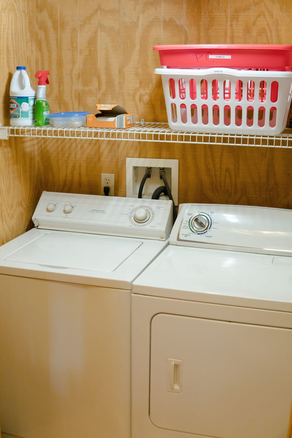 Laundry located downstairs in hallway