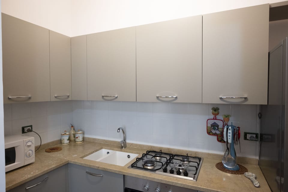Villa, 3 Bedrooms | Private kitchenette | Full-size fridge, oven, stovetop, highchair