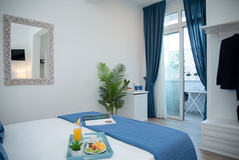 Deluxe Room (Blue) | Down comforters, memory foam beds, minibar, in-room safe