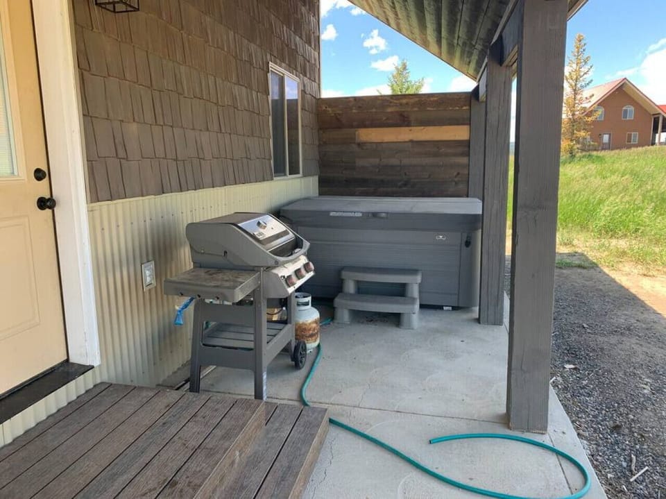 Hot tub and grill right out the door on the patio