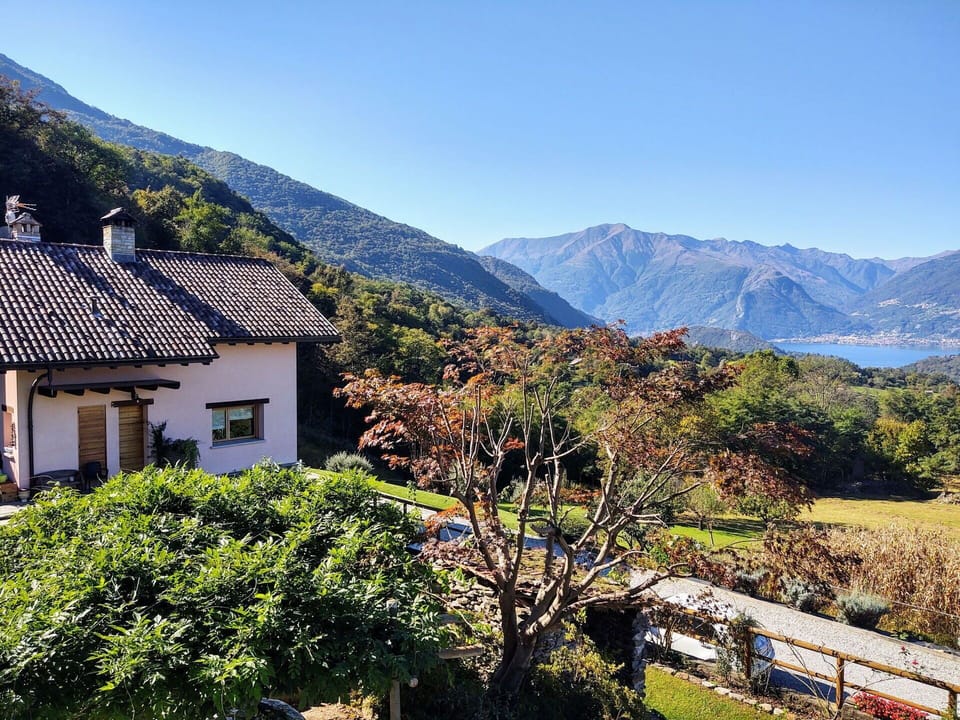 Sky, Plant, Mountain, Plant Community, Building, Nature, Natural Landscape, Window, Slope, Vegetation