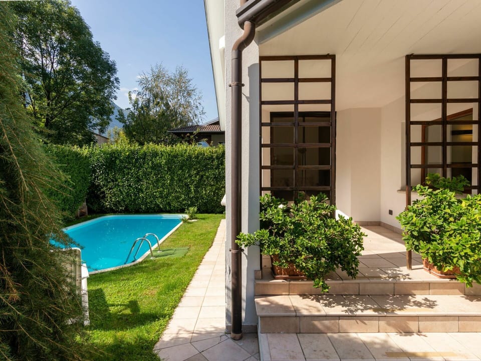 Plant, Building, Property, Water, Shade, Swimming Pool, Sky, Land Lot, Rectangle, Condominium