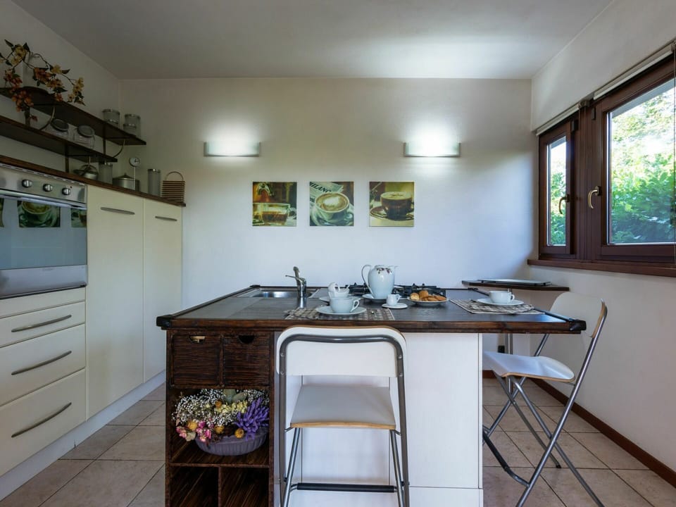 Furniture, Cabinetry, Table, Property, Countertop, Window, Kitchen, Building, Kitchen Appliance, Sink