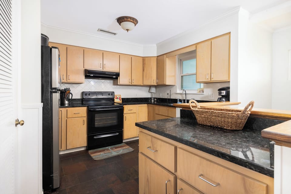 A fully-equipped kitchen is ready for mealtime