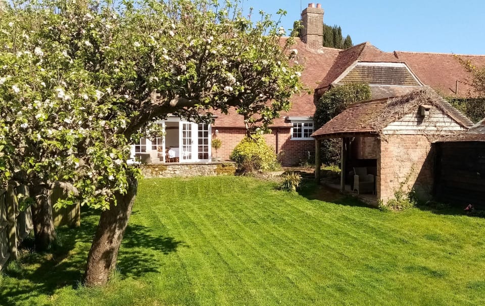 The attractive rear garden area to the cottage.