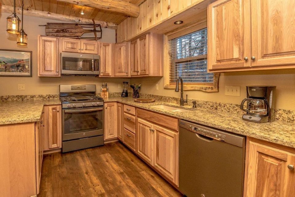 Culinary magic happens here, surrounded by warm wood and premium finishes.