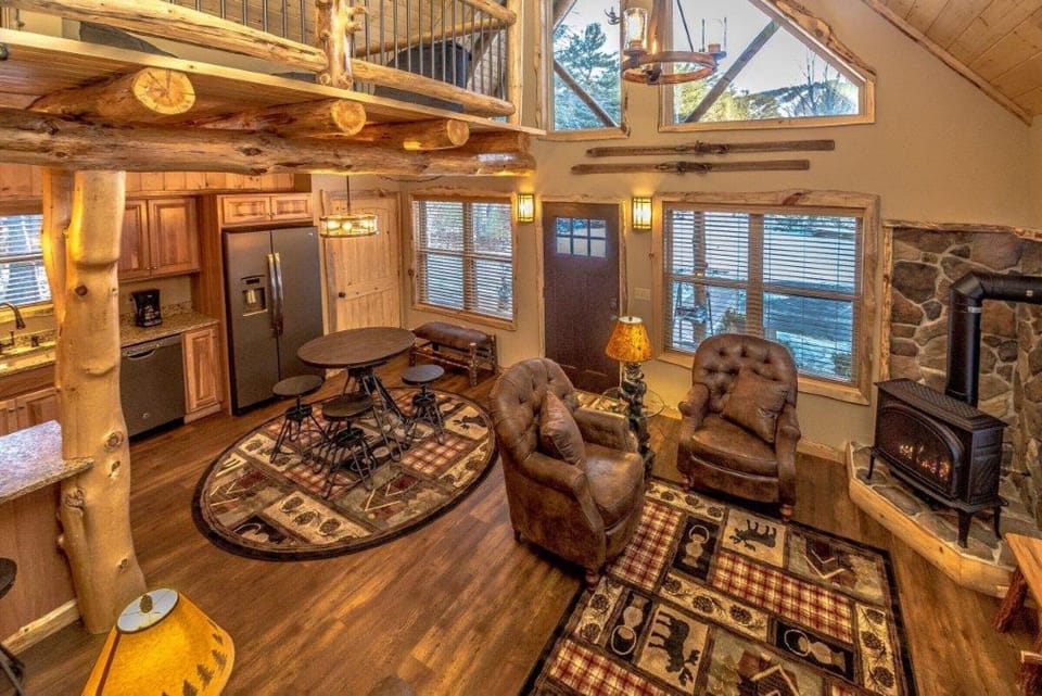 Experience the perfect blend of rugged textures and premium finishes in the heart of the cabin.