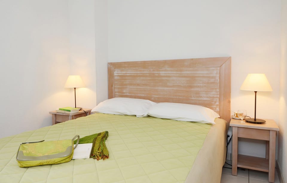 Get a good night's rest in the cozy bedroom.