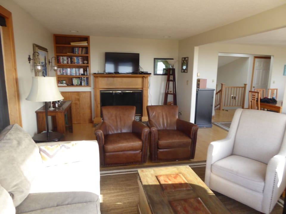 Spacious living room with fantastic beach and ocean views!