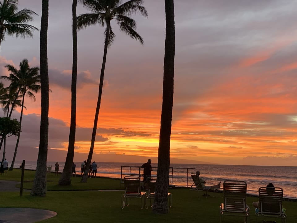 Meander yards away from the lanai with a glass of wine to take in the sunset.